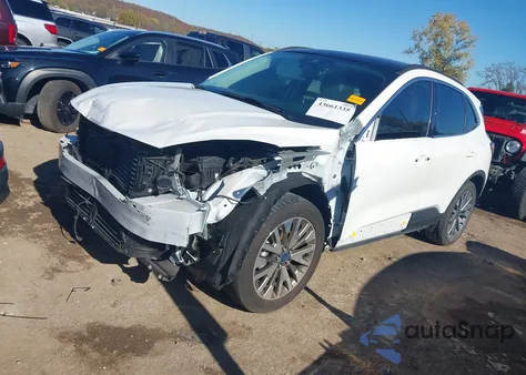 2021 Ford Escape Titanium z USA, uszkodzony, nr VIN 1FMCU9J90MUA30628